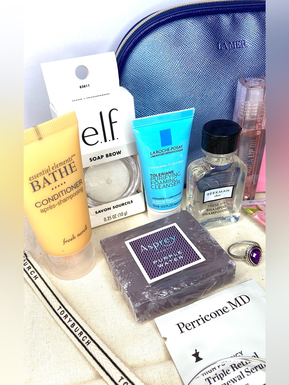 18 total LA MER Blue Pouch with Assorted Beauty Samples free Tory dust bag - Picture 3 of 5